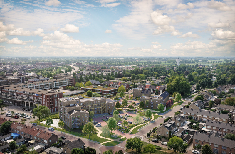 Luchtfoto van een woonwijk met woningen, appartementen, straten, parkeerplaatsen en veel groen. Op de voorgrond is een groen ingericht gebied tussen woongebouwen te zien.